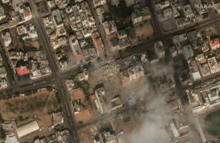 Satellite view of the destroyed Watan tower in Gaza City following Israeli strikes, October 10, 2023 in this handout image. Satellite image Maxar Technologies/Handout via REUTERS  THIS IMAGE HAS BEEN SUPPLIED BY A THIRD PARTY. MUST NOT OBSCURE LOGO. MANDATORY CREDIT. NO RESALES. NO ARCHIVES