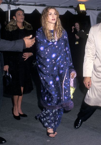 Madonna in a space-themed dress and cape