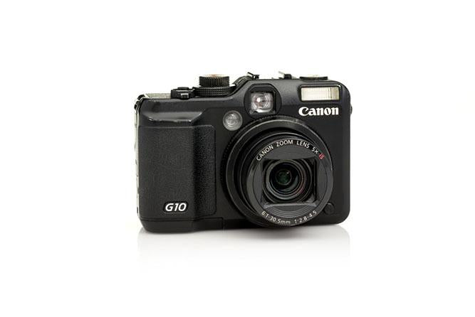 Photo of Canon camera on white background