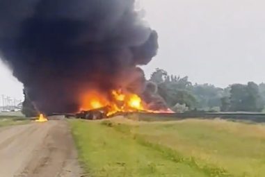 Hazardous material train cars derail, catch fire in North Dakota
